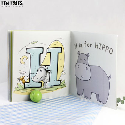 Inside pages of personalised name book for South Asian children showing illustrated letters and characters